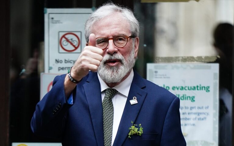 Gerry Adams arrives at the High Court in London to give evidence in the IRA bombing civil case