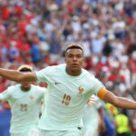 Mbappe Urges Caution as France Advance to World Cup Semi-Finals